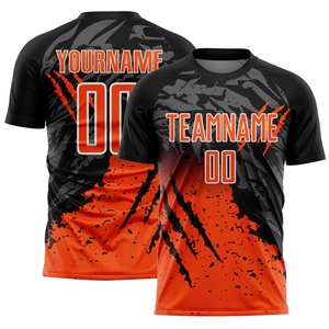ขายส่งโดยตรงจาก OMMIZ INDUSTRY ชุดฟุตบอลแบบ sublimation ลายธงชาติอเมริกันสีแดง ขาว-กรมท่า สไตล์วินเทจ แบบสั่งทำ - Product Image 4
