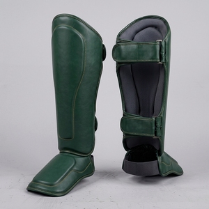 Protège-tibias professionnels en PU noirs avec fermeture élastique auto-agrippante pour la boxe – Équipement de protection léger unisexe pour adultes - Product Image 1
