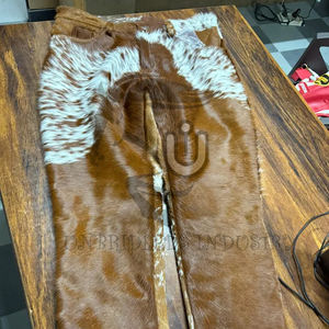 กางเกงหนังวัวแท้คุณภาพพรีเมียมสำหรับผู้ชาย ปี 2026 สีน้ำตาลและสีขาว จาก Unbridleds Industry ดีไซน์โดดเด่นทันสมัย - Product Image 1