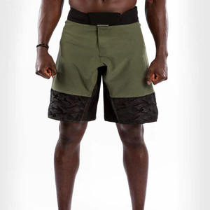 Shorts MMA Vert Camouflage Dernière Génération avec Tissu Durable à Séchage Rapide pour BJJ No-Gi, CrossFit, Entraînement en Cage, Combats – Shorts MMA Contrastés - Product Image 1