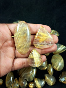 พลอยทับทิมธรรมชาติสีทองทรงหลังเบี้ยทรงผสมและขนาดต่างๆการรักษาขายส่งอัญมณีอัญมณีสำหรับทำเครื่องประดับ - Product Image 3