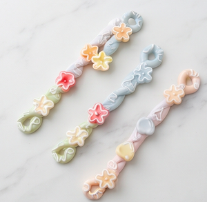 Soporte de silicona para cucharas con clip para olla, diseño floral de estrella, cuerda trenzada, color macaron, organizador de utensilios de cocina - Product Image 4