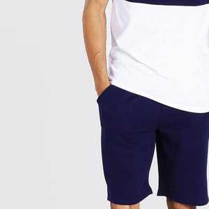 Ensemble décontracté pour homme : T-shirt blanc à col rond avec blocs de couleur marine et short marine – Respirant et idéal pour l'été - Product Image 5