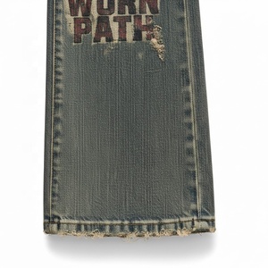 Jean en denim évasé taille haute avec patch aigle et délavage déchiré style vintage pour homme, streetwear en coton, collection automne - Product Image 3