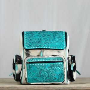 Sac à dos en cuir gaufré turquoise avec empiècements imprimés animaliers, forme carrée, fermeture éclair, bandoulière, style bohème, usage quotidien - Product Image 1