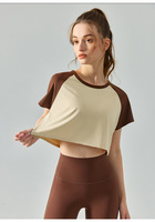 Nouveau T-shirt Sport Décontracté Femme 2025 – Col Montant Manches Longues Contraste de Couleurs – Vêtement d'Entraînement Actif Coupe Courte – Vente en Gros