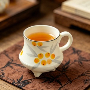 Taza de té de cerámica china tradicional con diseño de frutas, resistente al calor, para el té de la tarde - Product Image 1