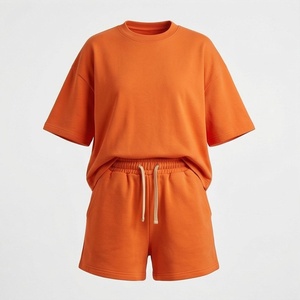 Ensemble de shorts tricotés 2 pièces orange pour femmes, col rond, manches courtes, coupe ample, couleur unie, décontracté, printemps-été - Product Image 1