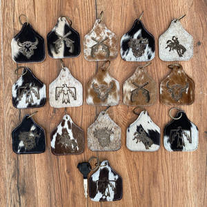 Llavero de cuero de vaca genuino con relieve láser personalizado llavero occidental con materiales de aleación de metal de cuero - Product Image 4