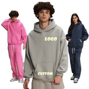 Ensemble de survêtement unisexe en molleton 350 GSM uni, coupe oversize, comprenant un sweat à capuche et un pantalon de survêtement, idéal pour l'impression de logo personnalisé par sérigraphie ou impression en mousse. - Product Image 1