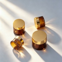 Pot vide en verre ambré pour crème visage avec bouchon à vis en aluminium doré 10g 15g 30g 60g pour soins de luxe en gros en stock