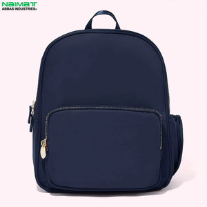 Mochila de nailon impermeable de gran capacidad en color caramelo para niños, mochilas escolares a la moda con cierre de cremallera. - Product Image 5