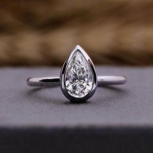 Women's Teardrop Shape Engagement and Anniversary <b>Ring</b> 18K White Gold Bezel <b>Set</b> with Pear Cut Lab Grown Diamond Wedding <b>Ring</b> - Product Image 1
