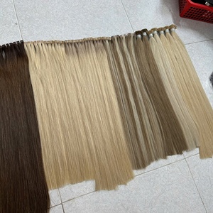 Natural <b>Tape</b> Hair Wholesale Color Russian Human Hair Extensions Raw Invisible <b>Tape</b> in Hair Extensions Vendors - Product Image 1