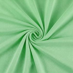Tissu jersey vert extensible, poids moyen, uni, couleur unie, en coton, fabriqué par Vaibhav Exports - Product Image 1