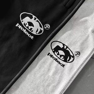 Pantalon de survêtement évasé ample en coton 100 % personnalisé OEM pour homme, brodé, à jambes larges, pour l'automne et l'hiver - Product Image 4