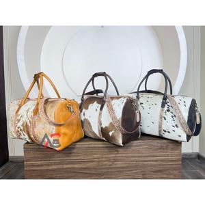 Nuevas Bolsas de Viaje Grandes de Cuero Genuino con Pelo Natural y Grabado, de Alta Calidad, para Unisex - Product Image 1