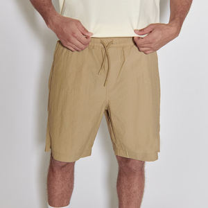 กางเกงบาสเก็ตบอลผ้าฝ้ายระบายอากาศทรงเรโทรสำหรับผู้ชาย สีพื้น สไตล์ลำลอง ความยาวครึ่งเข่า ทรงหลวม ใส่ได้ทั้งชายและหญิง - Product Image 3