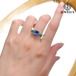 Anillo de cóctel para mujer Jewelux de alta calidad con circonita púrpura en el centro y piedras laterales de corte pera verde, engaste de garras, estilo de lujo - Product Image 6