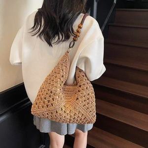 Nouveau Sac à Bandoulière de Plage Tressé Creux Vintage Tendance pour Femme, Grande Capacité, Style Voyage et Shopping - Product Image 1