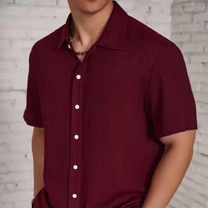 เสื้อเชิ้ตแขนสั้นผู้ชาย ระบายอากาศได้ดี เนื้อผ้ามีเท็กซ์เจอร์ คอปกคิวบา สไตล์ลำลอง ใส่ได้ในฤดูร้อน ติดกระดุม แฟชั่นสตรีทแวร์ รับผลิตแบบ OEM ตามสั่ง - Product Image 1