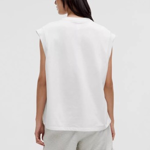 Camiseta sin mangas de cuello redondo blanca para mujer, minimalista, de punto, color liso, longitud regular, 100% algodón - Product Image 2