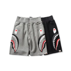 Shorts de sport d'été pour hommes en gros – Écologiques, séchage rapide, polyester/coton, couleur unie, poches latérales – Idéaux pour la gym, le basketball, la course et le fitness - Product Image 1