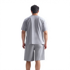 เสื้อยืดคอตตอนสีเทาทรงโอเวอร์ไซส์สำหรับผู้ชาย ชุดเสื้อยืดแขนสั้น คอกลม สีพื้น สวมใส่สบาย ระบายอากาศได้ดี ผลิตจากผ้าเจอร์ซีย์ - Product Image 6