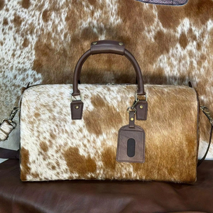 Custom Logo Fashion Genuine <b>Leather</b> Hair Lightweight Large Capacity Adjustable Strap Zipper Closure Travel Duffel <b>Bag</b> Wholesale - Product Image 1