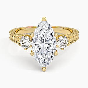 Bague de fiançailles en moissanite taille marquise avec bande gravée vintage et pierres latérales - Product Image 1