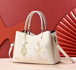 Cream Embroidered Lily Handbag with Leaf Charm and <b>Adjustable</b> Strap Fashionable jewelry clutch bag luxury faction bag - Product Image 4
