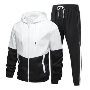 Chándal para hombre con chaqueta con cremallera diseñado con tela de algodón mezclado de alta calidad que ofrece comodidad y estilo para entrenamientos en el gimnasio y correr. - Product Image 1