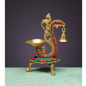 Diya de Latón con Diseño de Pavo Real Tallado Estilo Art Deco Étnico con Campana para Diwali, Hermosa Lámpara de Aceite con Forma de Pavo Real a Precio de Mayoreo Económico - Product Image 1