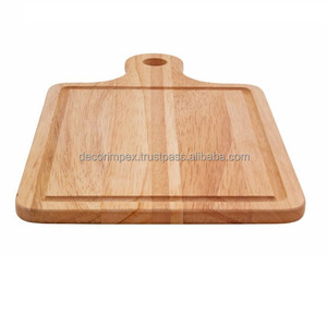 Una tabla de cortar de madera, comúnmente utilizada para preparar y servir alimentos. Estas tablas son apreciadas por su durabilidad, - Product Image 1
