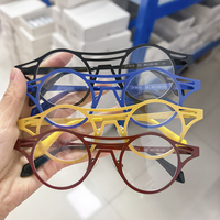 Lunettes optiques rondes en acier inoxydable colorées, monture épaisse et audacieuse, assortiment de couleurs tendance, haute qualité, vente en gros