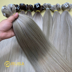 Extensiones de cabello humano vietnamita 100% al por mayor, tejidas a máquina, con textura y longitud de cabello personalizables de 10 a 34 pulgadas. - Product Image 1
