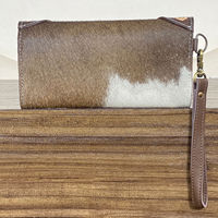 Portefeuille long en cuir véritable de vachette de haute qualité pour femme, avec blocage RFID, porte-cartes et pochette à monnaie, fait main, orné d'un concho