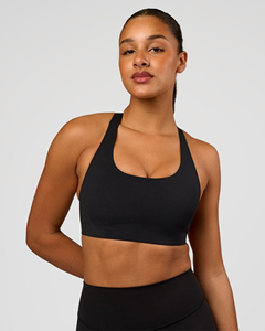 Sujetador deportivo de color liso para mujer, espalda cruzada, cuello redondo, soporte medio, sin costuras, para yoga y entrenamiento, negro - Product Image 1