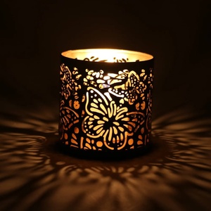 Porte-bougie cylindrique en fer avec découpes florales, effet de lumière chaude, décoration d'intérieur, résistant à la chaleur, impression par découpe. - Product Image 1