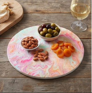 Planche à découper ronde de style contemporain avec motif marbré rose pastel, menthe et orange, et trou de suspension - Product Image 5