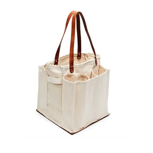 Bolsa de yute estructurada con asas de cuero y múltiples bolsillos, diseño utilitario para compras, viajes, uso diario y uso doméstico. - Product Image 1