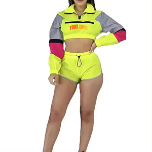 Conjunto de 2 piezas para mujer de alta calidad: cortavientos, top corto y shorts con cremallera bordados con encaje, color liso hasta la rodilla, estilo vintage. OEM ODM. Tallas. - Product Image 6