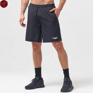 Shorts de course athlétiques pour hommes, séchage rapide, poches zippées, légers, pour la gym et la randonnée, style sportif uni - Product Image 1