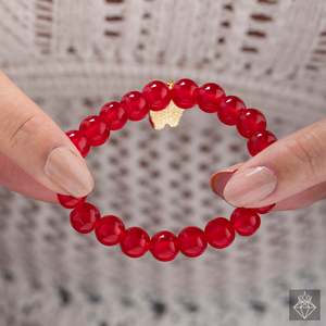 Le bracelet à breloques papillon rouge élégant de PRAO Accessoire de mode saisissant - Product Image 1