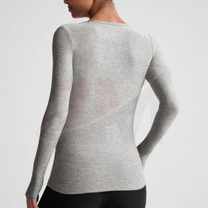 Camiseta de compresión personalizada OEM para mujer, de secado rápido, ropa deportiva para entrenamiento en el gimnasio y actividades físicas. - Product Image 2