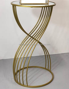 Mesa auxiliar curvada de metal de hierro hecha a mano con diseño moderno al por mayor mesa de centro dorada elemento decorativo - Product Image 1