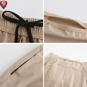 Shorts d'été pour hommes en polyester tricoté écologique, séchage rapide, taille mi-haute élastique avec cordon de serrage, décontracté, sport, gris clair - Product Image 4