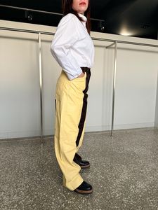 Pantalones de mujer de cintura alta, acampanados, de piel sintética, con paneles de colores, estilo motociclista, largos, holgados, para invierno - Product Image 6