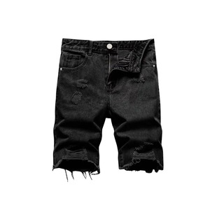Shorts en jean vintage bleu ultra-courts pour femme, taille haute, déchirés, avec franges - Product Image 1