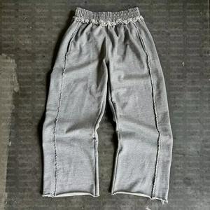 กางเกงวอร์มสตรีทแวร์ทรงหลวม ขอบดิบ ลายทาง ผ้าฝ้ายเฟรนช์เทอร์รี่เนื้อหนา สีเทา ขาดๆ แบบวินเทจ ขากว้าง สำหรับผู้ชาย - Product Image 1